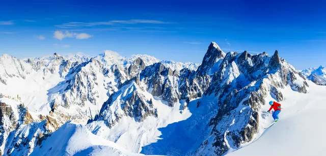Skiing Vallee Blanche Chamonix with amazing panorama of Grandes Jorasses and Dent du Geant from Aiguille du Midi, Mont Blanc mountain