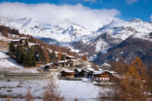view of the small town of Antagnod with Mont Blanc in the background, after a snowfall.