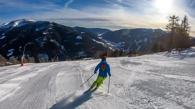 A man skiing on perfectly groomed slopes in Bad Kleinkirchheim, Austria. Winter sports.