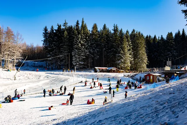Family winter ski resort Il Lago della Ninfa. Monte Cimone, mountains in the northern Apennines, of Italy, Emilia-Romagna.