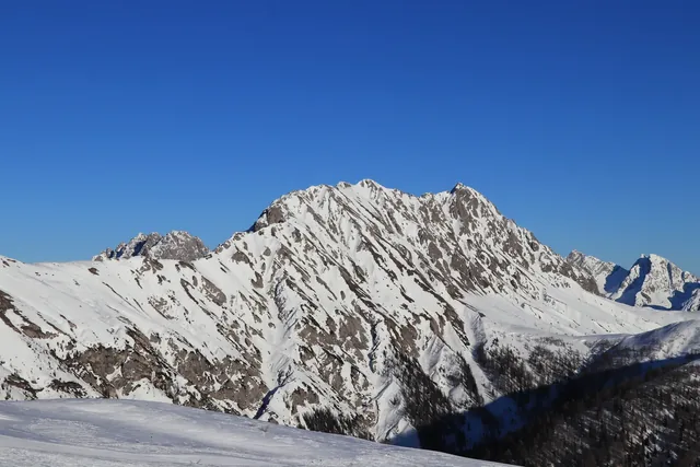 Magnificent views of the Tyrolean Alps in western Austria especially the rocky mountain Eggenkofel from the Obertilliach ski resort