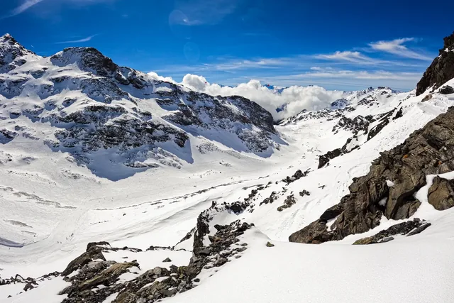 Valley of Plan Bouchet above the mountain town of Orelle in the ski domain of the Trois Vallées - Ski slopes accessible from Val Thorens in winter
