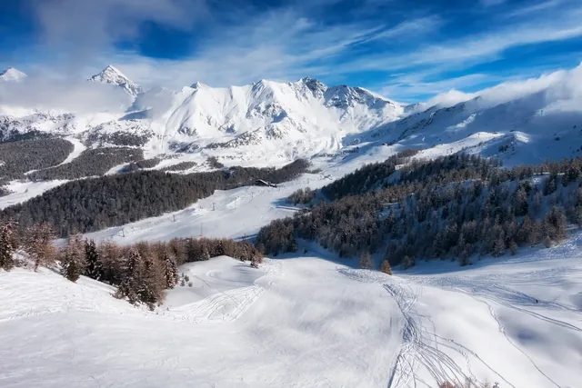 aerial mountain view of Pila ski resort in winter, Aosta, Italy